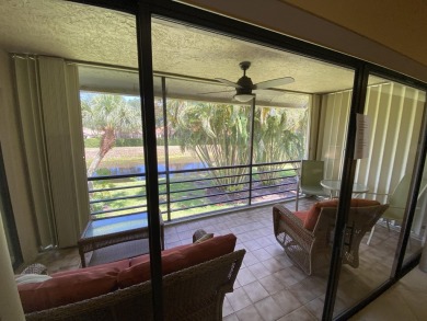 Beautiful unit with relaxing view from screen porch ready for on Indian Spring Golf and Country Club in Florida - for sale on GolfHomes.com, golf home, golf lot
