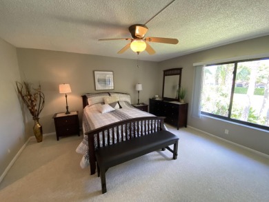 Beautiful unit with relaxing view from screen porch ready for on Indian Spring Golf and Country Club in Florida - for sale on GolfHomes.com, golf home, golf lot