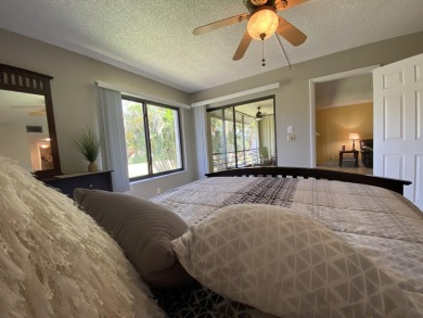 Beautiful unit with relaxing view from screen porch ready for on Indian Spring Golf and Country Club in Florida - for sale on GolfHomes.com, golf home, golf lot