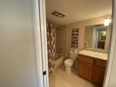 Beautiful unit with relaxing view from screen porch ready for on Indian Spring Golf and Country Club in Florida - for sale on GolfHomes.com, golf home, golf lot