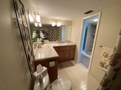 Beautiful unit with relaxing view from screen porch ready for on Indian Spring Golf and Country Club in Florida - for sale on GolfHomes.com, golf home, golf lot