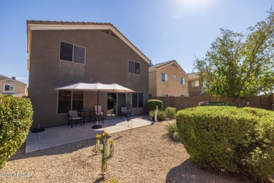 This expansive home overlooks the 9th hole of the golf course on Oasis Golf Club in Arizona - for sale on GolfHomes.com, golf home, golf lot