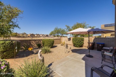 This expansive home overlooks the 9th hole of the golf course on Oasis Golf Club in Arizona - for sale on GolfHomes.com, golf home, golf lot