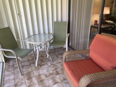 Beautiful unit with relaxing view from screen porch ready for on Indian Spring Golf and Country Club in Florida - for sale on GolfHomes.com, golf home, golf lot