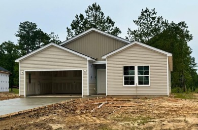 Enjoy one-story living at its finest in the Durham floorplan on Players Course At Wyboo Plantation in South Carolina - for sale on GolfHomes.com, golf home, golf lot