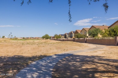 This expansive home overlooks the 9th hole of the golf course on Oasis Golf Club in Arizona - for sale on GolfHomes.com, golf home, golf lot