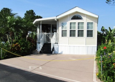 Welcome to your new DREAM HOME, located at 205 Arnold Palmer Dr on Deer Creek RV Golf Resort in Florida - for sale on GolfHomes.com, golf home, golf lot