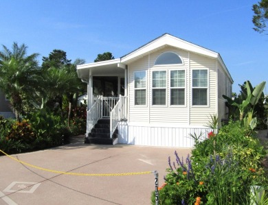 Welcome to your new DREAM HOME, located at 205 Arnold Palmer Dr on Deer Creek RV Golf Resort in Florida - for sale on GolfHomes.com, golf home, golf lot