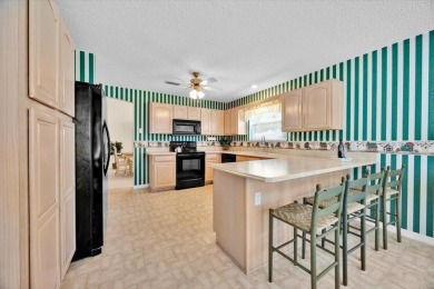Stunning 3-bedroom, 2-bath home with 1,906 sq. ft. in the highly on Hacienda Hills Golf and Country Club in Florida - for sale on GolfHomes.com, golf home, golf lot