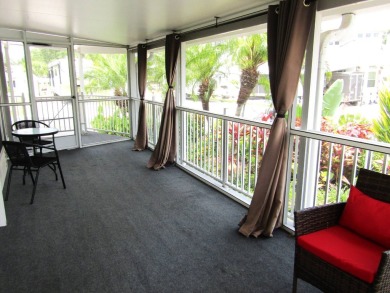 Welcome to your new DREAM HOME, located at 205 Arnold Palmer Dr on Deer Creek RV Golf Resort in Florida - for sale on GolfHomes.com, golf home, golf lot