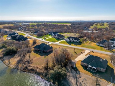 Build your custom home on this WATERFRONT lot in the Reserve at on Sugar Tree Golf and Country Club in Texas - for sale on GolfHomes.com, golf home, golf lot