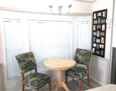 Welcome to your new DREAM HOME, located at 205 Arnold Palmer Dr on Deer Creek RV Golf Resort in Florida - for sale on GolfHomes.com, golf home, golf lot
