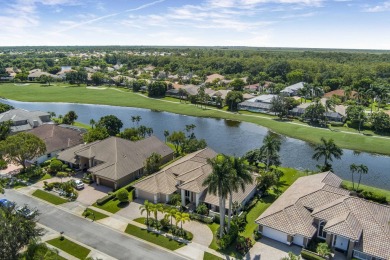 Enjoy sweeping lake and golf course views from this beautifully on Stonebridge Golf and Country Club in Florida - for sale on GolfHomes.com, golf home, golf lot