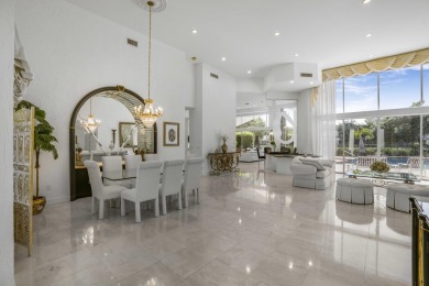 Enjoy sweeping lake and golf course views from this beautifully on Stonebridge Golf and Country Club in Florida - for sale on GolfHomes.com, golf home, golf lot