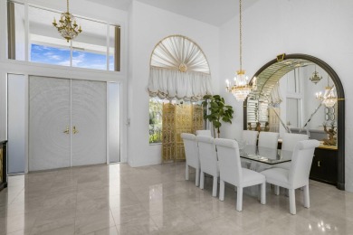 Enjoy sweeping lake and golf course views from this beautifully on Stonebridge Golf and Country Club in Florida - for sale on GolfHomes.com, golf home, golf lot