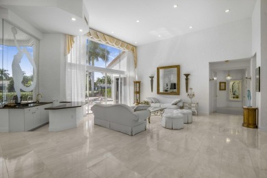 Enjoy sweeping lake and golf course views from this beautifully on Stonebridge Golf and Country Club in Florida - for sale on GolfHomes.com, golf home, golf lot