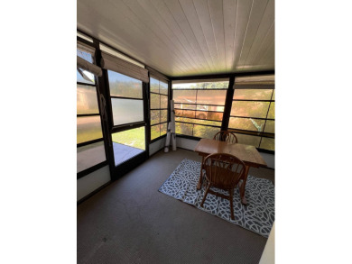 Cozy furnished home with no rear neighbors, ready for you to on Lake Henry Golf Club in Florida - for sale on GolfHomes.com, golf home, golf lot