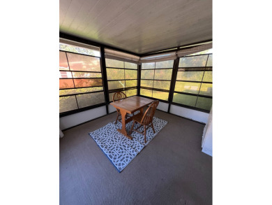 Cozy furnished home with no rear neighbors, ready for you to on Lake Henry Golf Club in Florida - for sale on GolfHomes.com, golf home, golf lot