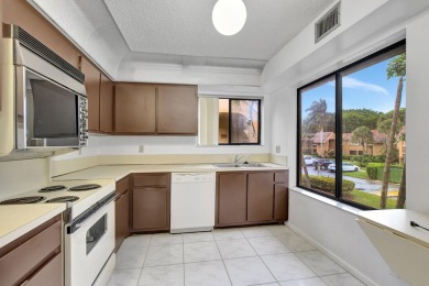 Discover this beautifully updated 2-bedroom, 2-bath condo on Indian Spring Golf and Country Club in Florida - for sale on GolfHomes.com, golf home, golf lot
