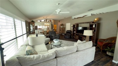 Discover the charm of this beautifully updated 3-bedroom on Heritage Pines Country Club in Florida - for sale on GolfHomes.com, golf home, golf lot