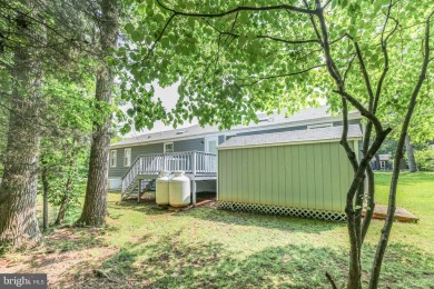 Beautiful, well-maintained home with a front porch that on Lake Of The Woods Golf Course in Virginia - for sale on GolfHomes.com, golf home, golf lot