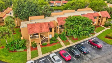 Discover this beautifully updated 2-bedroom, 2-bath condo on Indian Spring Golf and Country Club in Florida - for sale on GolfHomes.com, golf home, golf lot