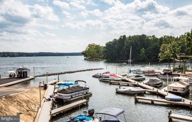 Beautiful, well-maintained home with a front porch that on Lake Of The Woods Golf Course in Virginia - for sale on GolfHomes.com, golf home, golf lot
