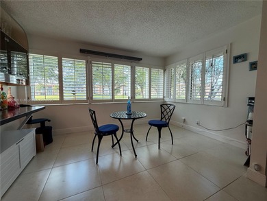 Spectacular 2/2 Condo with lots of amenities and completely on Sunrise Lakes Phase IV Golf Course in Florida - for sale on GolfHomes.com, golf home, golf lot