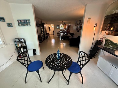 Spectacular 2/2 Condo with lots of amenities and completely on Sunrise Lakes Phase IV Golf Course in Florida - for sale on GolfHomes.com, golf home, golf lot