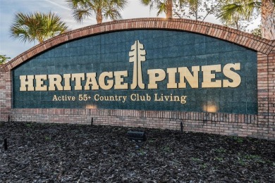 Discover the charm of this beautifully updated 3-bedroom on Heritage Pines Country Club in Florida - for sale on GolfHomes.com, golf home, golf lot