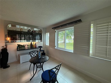 Spectacular 2/2 Condo with lots of amenities and completely on Sunrise Lakes Phase IV Golf Course in Florida - for sale on GolfHomes.com, golf home, golf lot