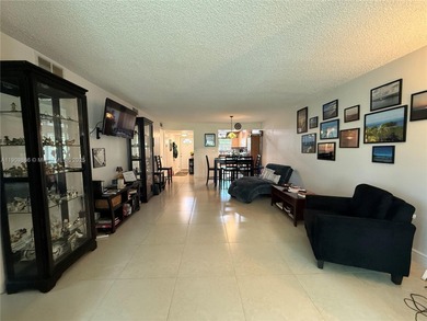 Spectacular 2/2 Condo with lots of amenities and completely on Sunrise Lakes Phase IV Golf Course in Florida - for sale on GolfHomes.com, golf home, golf lot