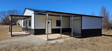 Cozy barndominium ready for your finishing touches! This metal on Linn Valley Lakes - Deer Trace Golf Course in Kansas - for sale on GolfHomes.com, golf home, golf lot