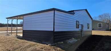Cozy barndominium ready for your finishing touches! This metal on Linn Valley Lakes - Deer Trace Golf Course in Kansas - for sale on GolfHomes.com, golf home, golf lot