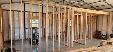 Cozy barndominium ready for your finishing touches! This metal on Linn Valley Lakes - Deer Trace Golf Course in Kansas - for sale on GolfHomes.com, golf home, golf lot