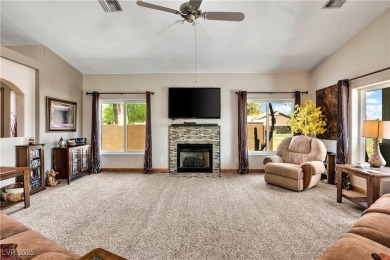 Nestled between the majestic backdrop of golf course greens and on Mojave Resort Golf Club in Nevada - for sale on GolfHomes.com, golf home, golf lot