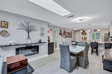 Gorgeous end-unit villa in a prime location with stunning on Highland Lakes Executive Golf Course in Florida - for sale on GolfHomes.com, golf home, golf lot
