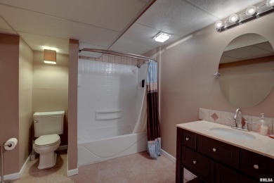 Take a look at this sprawling brick ranch in Spring Lake Estates on Spring Lake Country Club in Illinois - for sale on GolfHomes.com, golf home, golf lot