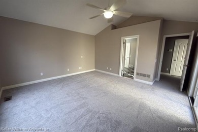 Beautifully maintained ranch end unit condo in the highly on Bushwood Golf Club in Michigan - for sale on GolfHomes.com, golf home, golf lot