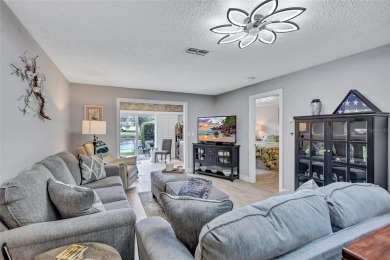 Gorgeous end-unit villa in a prime location with stunning on Highland Lakes Executive Golf Course in Florida - for sale on GolfHomes.com, golf home, golf lot