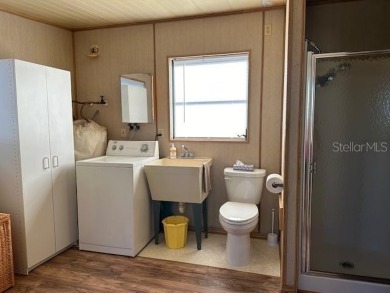 NO LOT RENT, it is a deeded lot, 2 bedrooms 1-1/2 Baths on Tooke on Glen Lakes Country Club in Florida - for sale on GolfHomes.com, golf home, golf lot