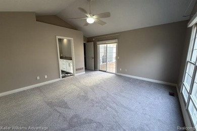 Beautifully maintained ranch end unit condo in the highly on Bushwood Golf Club in Michigan - for sale on GolfHomes.com, golf home, golf lot