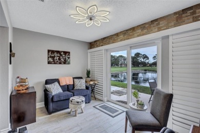 Gorgeous end-unit villa in a prime location with stunning on Highland Lakes Executive Golf Course in Florida - for sale on GolfHomes.com, golf home, golf lot