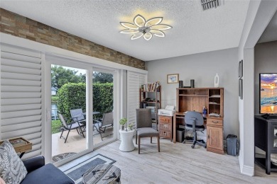 Gorgeous end-unit villa in a prime location with stunning on Highland Lakes Executive Golf Course in Florida - for sale on GolfHomes.com, golf home, golf lot