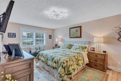 Gorgeous end-unit villa in a prime location with stunning on Highland Lakes Executive Golf Course in Florida - for sale on GolfHomes.com, golf home, golf lot