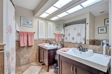 Gorgeous end-unit villa in a prime location with stunning on Highland Lakes Executive Golf Course in Florida - for sale on GolfHomes.com, golf home, golf lot