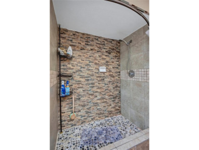 Gorgeous end-unit villa in a prime location with stunning on Highland Lakes Executive Golf Course in Florida - for sale on GolfHomes.com, golf home, golf lot