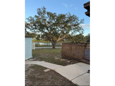 NO LOT RENT, it is a deeded lot, 2 bedrooms 1-1/2 Baths on Tooke on Glen Lakes Country Club in Florida - for sale on GolfHomes.com, golf home, golf lot