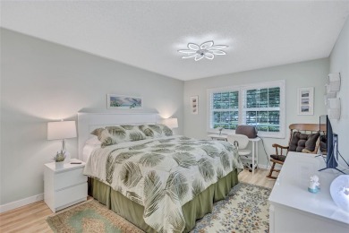 Gorgeous end-unit villa in a prime location with stunning on Highland Lakes Executive Golf Course in Florida - for sale on GolfHomes.com, golf home, golf lot