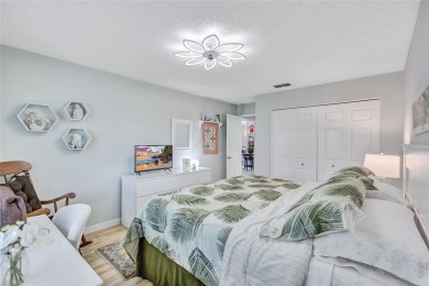 Gorgeous end-unit villa in a prime location with stunning on Highland Lakes Executive Golf Course in Florida - for sale on GolfHomes.com, golf home, golf lot